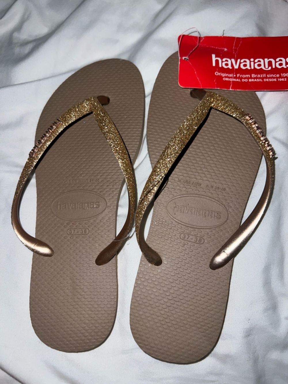 Havaianas Glitter Strap Flip Flops in Brown with Gold